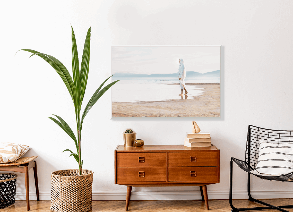 Christ on the seashore, calming still water and grey, blue, sandy neutral hues. Serene landscape of the contemplative Christ bringing calm to any room. A beautiful portrait of the Savior by H. Walker Photoart. The Prince of Our Peace is the perfect addition to any room. Religious Art.