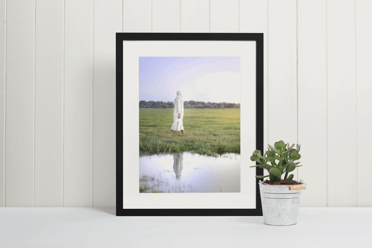Infusing light into any space, this portrait of Christ embodies a brightness of hope and kindness. Calming hues of neutral colors compliment all types of home decor. Modern minimalist portrait of Jesus Christ for your Christian home or as the perfect gift for someone you love. H. Walker @thelightgallery_